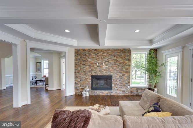9423 Old Courthouse Road Vienna, VA 22182 - Photo 12 of 30 a living room with furniture and a fireplace