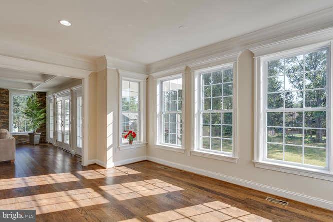 9423 Old Courthouse Road Vienna, VA 22182 - Photo 17 of 30 a view of an entryway with wooden floor and windows