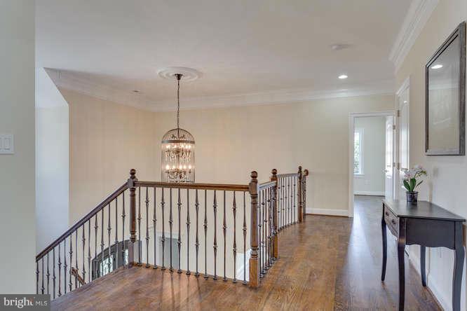 9423 Old Courthouse Road Vienna, VA 22182 - Photo 20 of 30 a view of a hallway with chandelier and entryway