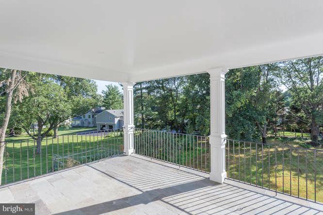 9423 Old Courthouse Road Vienna, VA 22182 - Photo 30 of 30 a view of a balcony with lake view and a floor to ceiling window