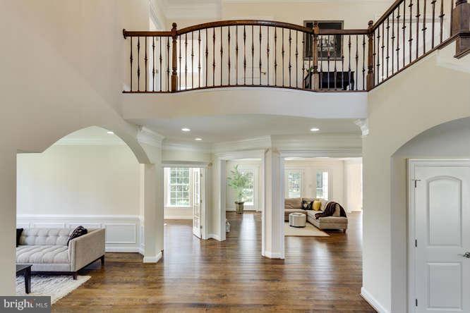 9423 Old Courthouse Road Vienna, VA 22182 - Photo 5 of 30 a view of livingroom with furniture and wooden floor