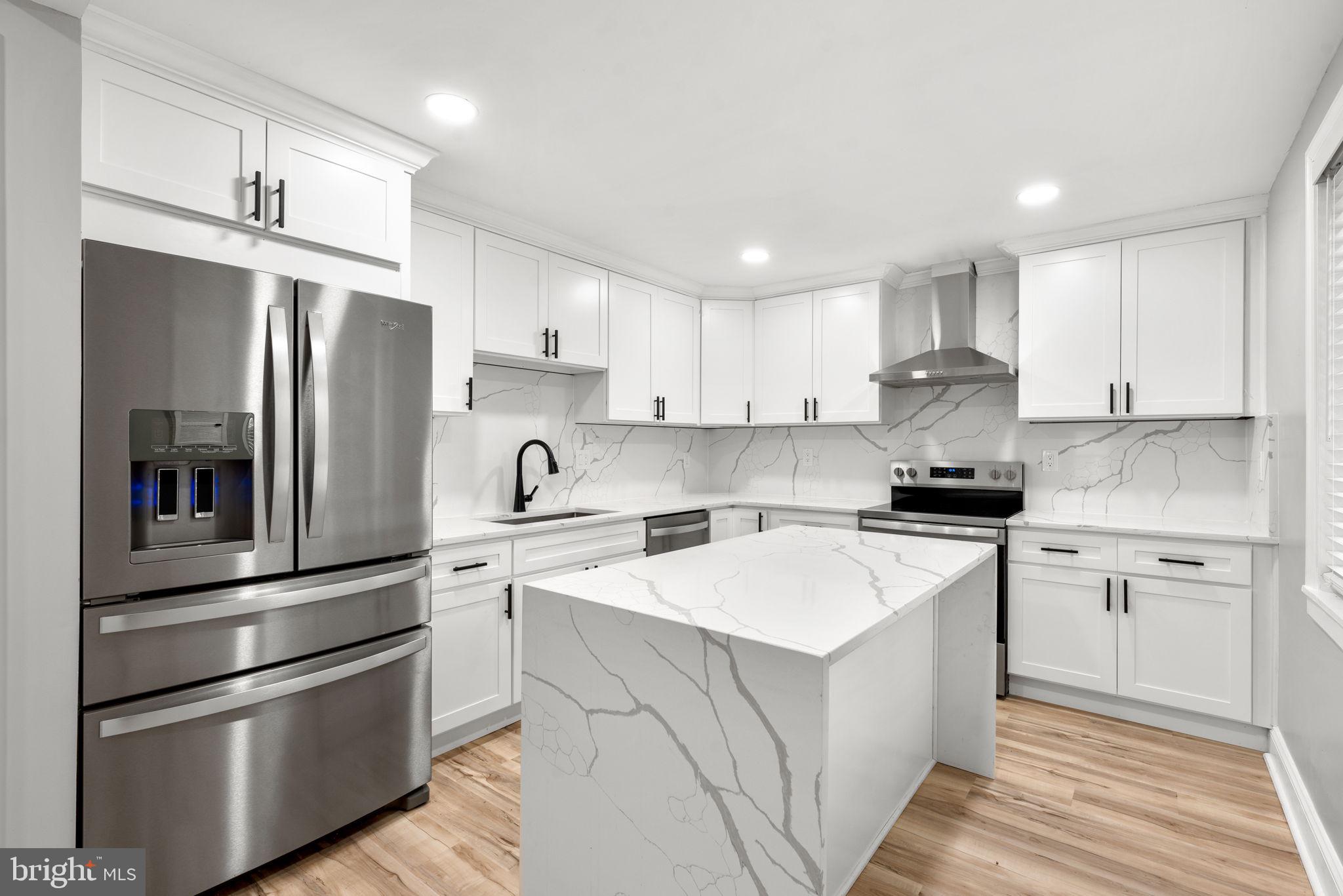 3406 Louth Road Dundalk, MD 21222 - Photo 1 of 30 a kitchen with cabinets stainless steel appliances and a counter space
