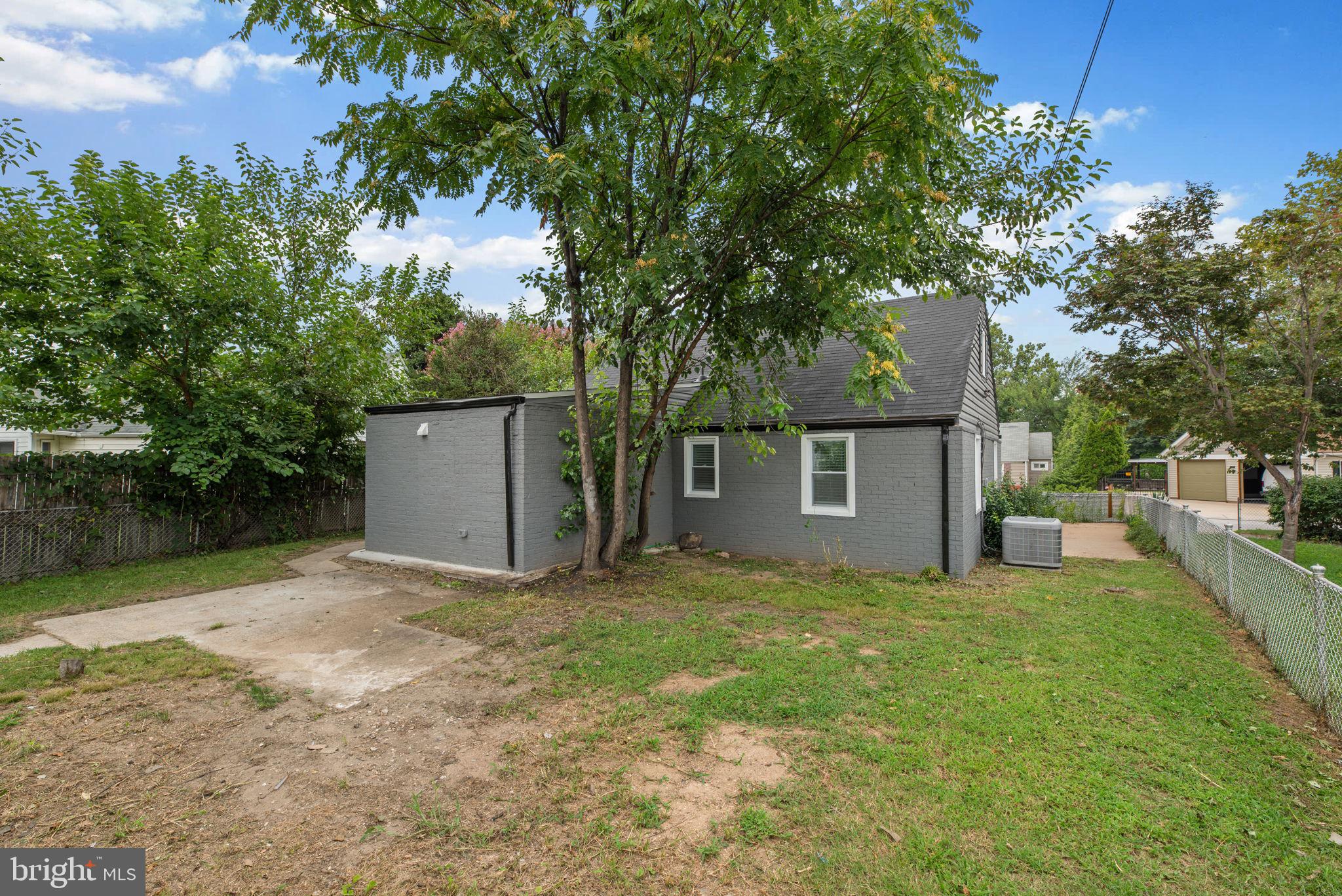 3406 Louth Road Dundalk, MD 21222 - Photo 29 of 30 a view of a house with a yard