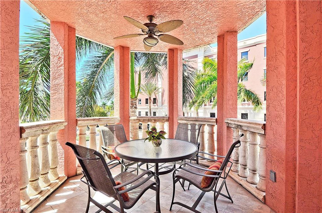 a dining room with furniture window and outside view