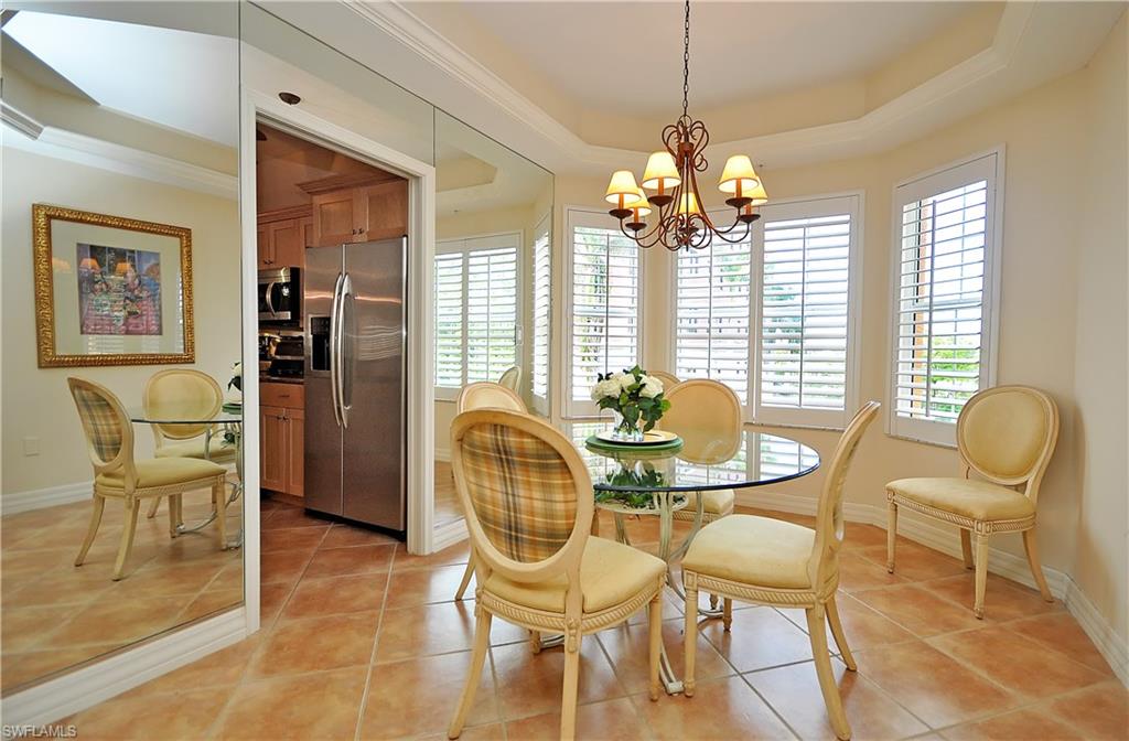 401 Bayfront Place, Unit 3201 Naples, FL 34102 - Photo 7 of 24 a dining room with furniture and window