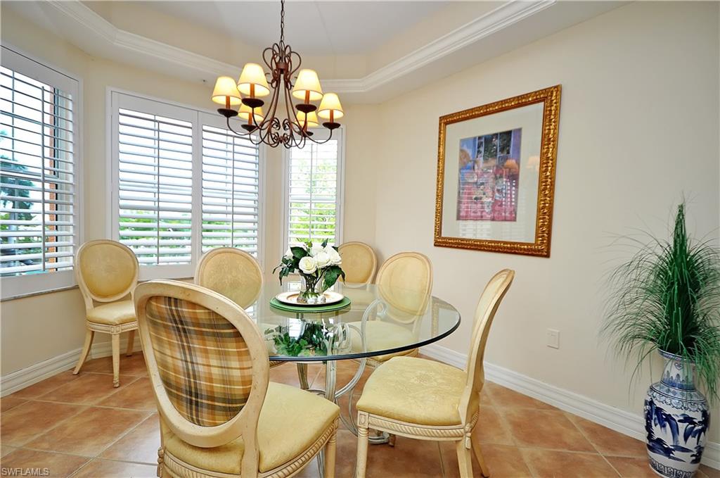 401 Bayfront Place, Unit 3201 Naples, FL 34102 - Photo 8 of 24 a dining room with furniture and window
