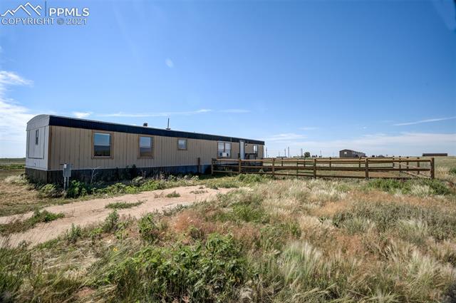 5274 South Yoder Road Yoder, CO 80864 - Photo 18 of 42 FENCED IN YARD FOR 5354 HOME