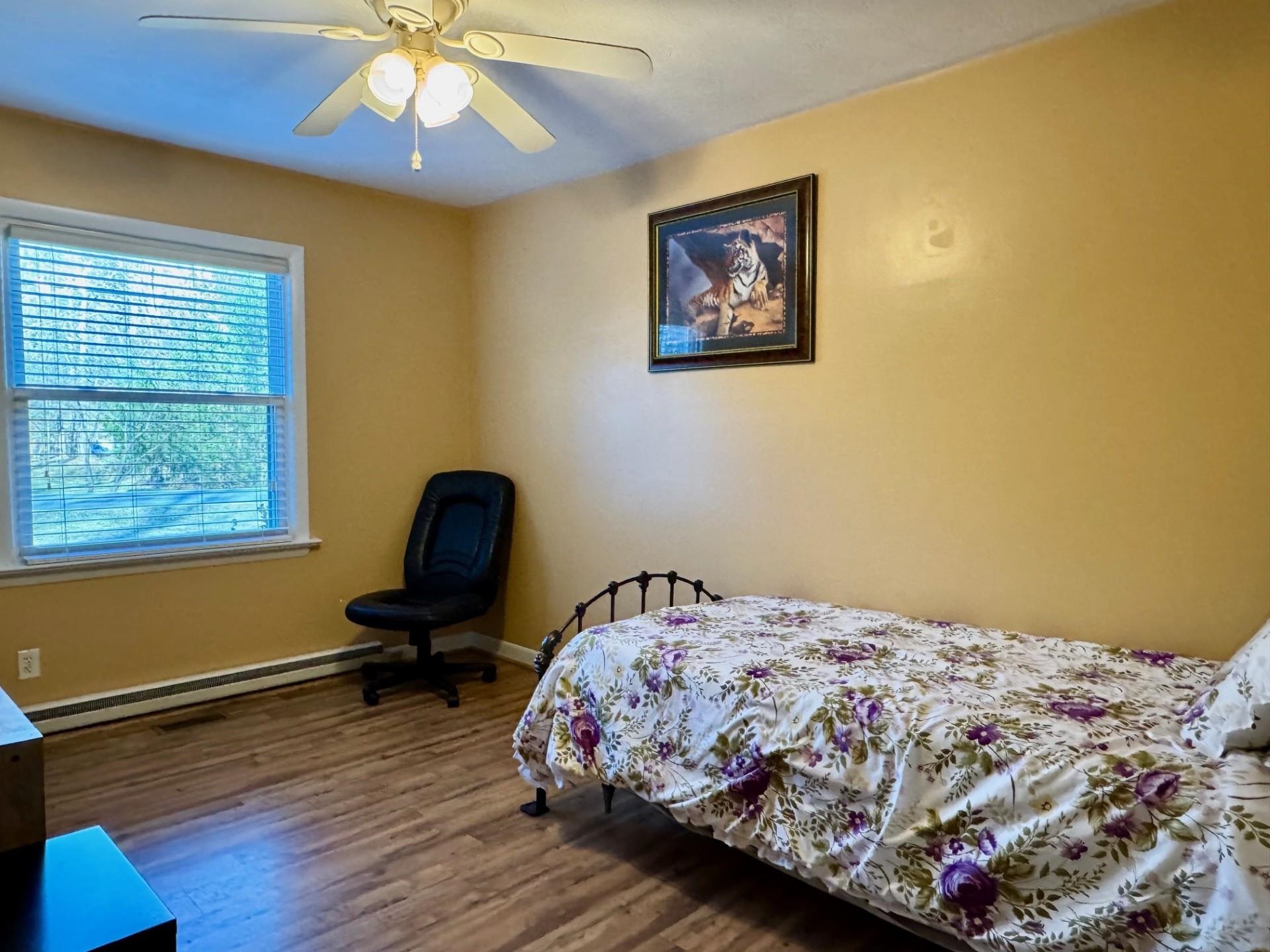8127 Briery Branch Road Dayton, VA 22821 - Photo 11 of 23 a bedroom with bed and a window
