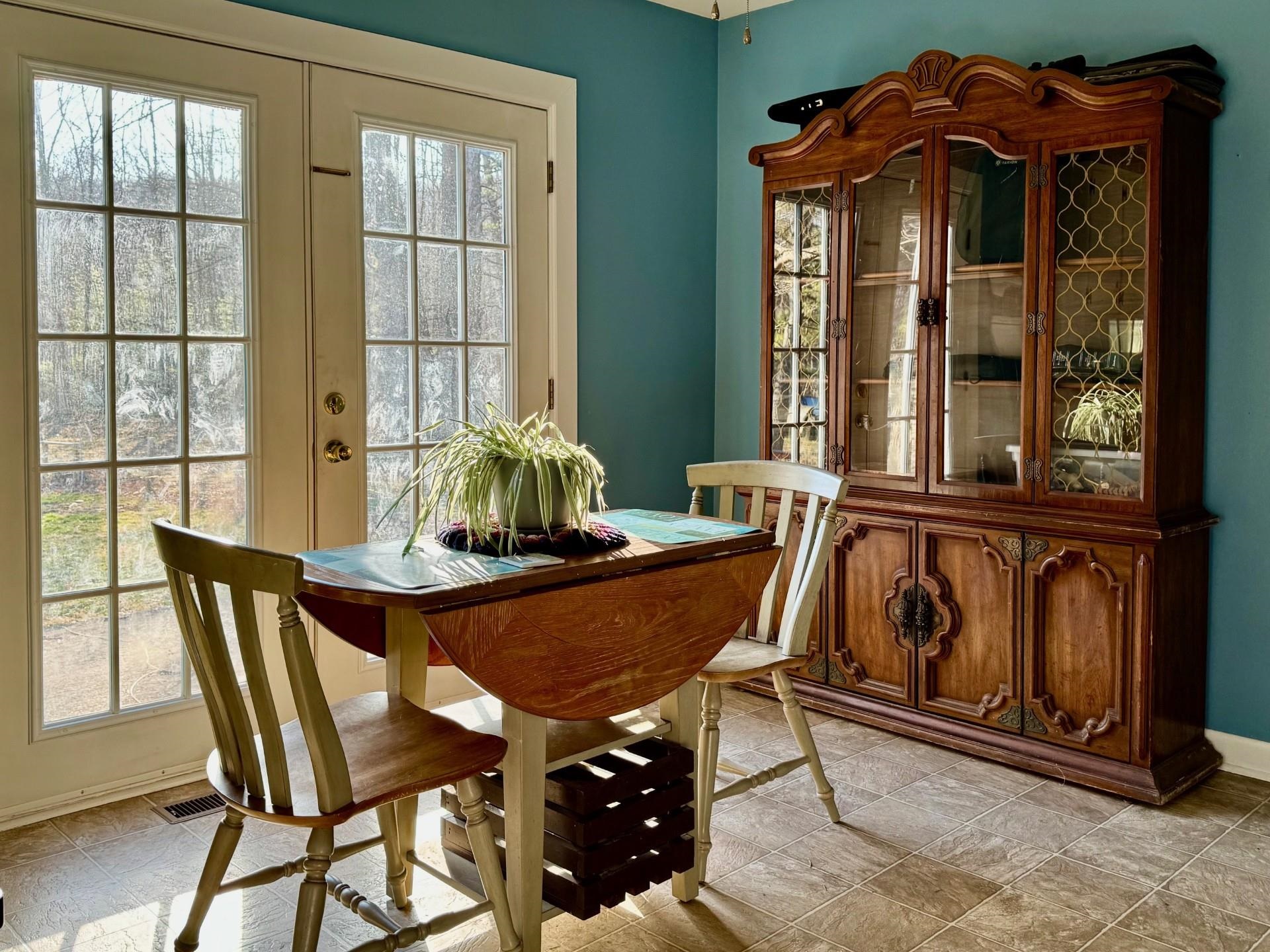 8127 Briery Branch Road Dayton, VA 22821 - Photo 5 of 23 a view of a dining room with furniture window and outside view