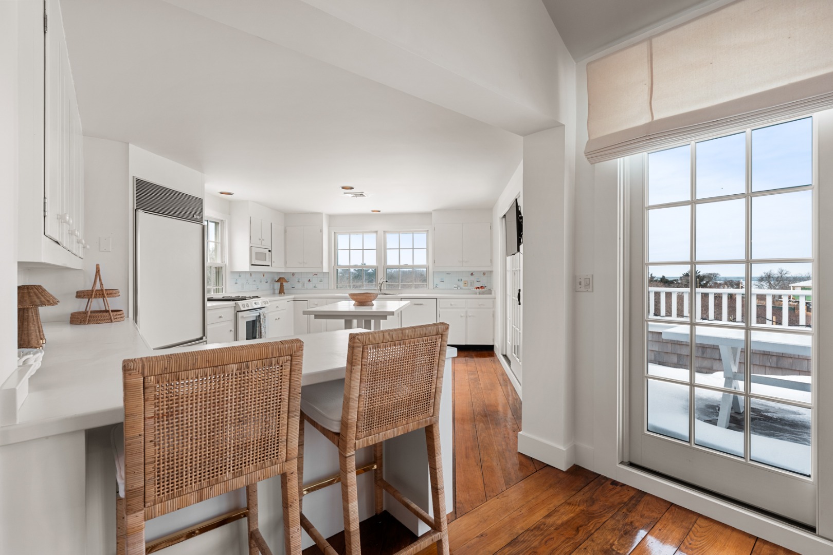 6 Fargo Way Nantucket, MA 02554 - Photo 7 of 28 a kitchen with stainless steel appliances wooden floor and dining table
