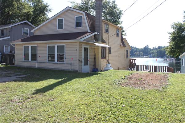 55 Pequot Point Road Westfield, MA 01085 - Photo 1 of 1 front view of a house with a yard