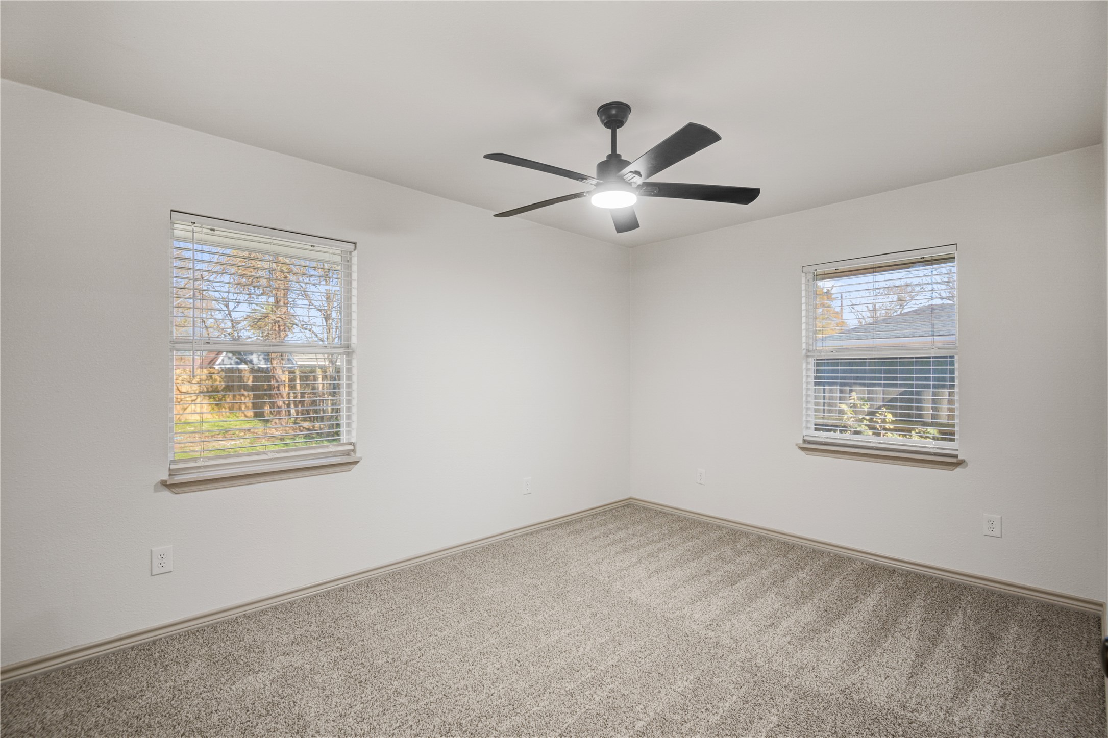 1530 West 10th Street Freeport, TX 77541 - Photo 15 of 32 a view of an empty room with a window