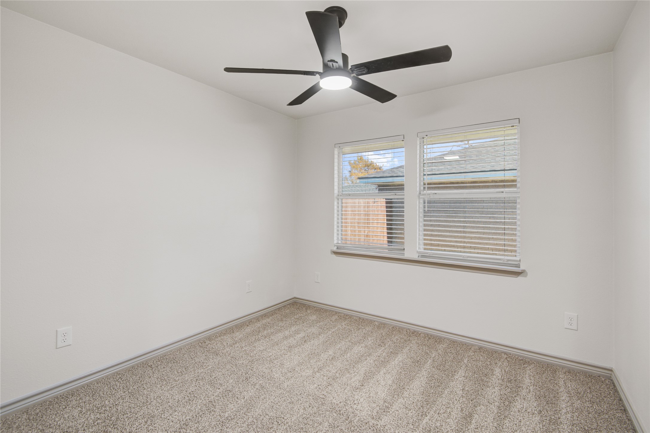 1530 West 10th Street Freeport, TX 77541 - Photo 19 of 32 a view of an empty room with a window