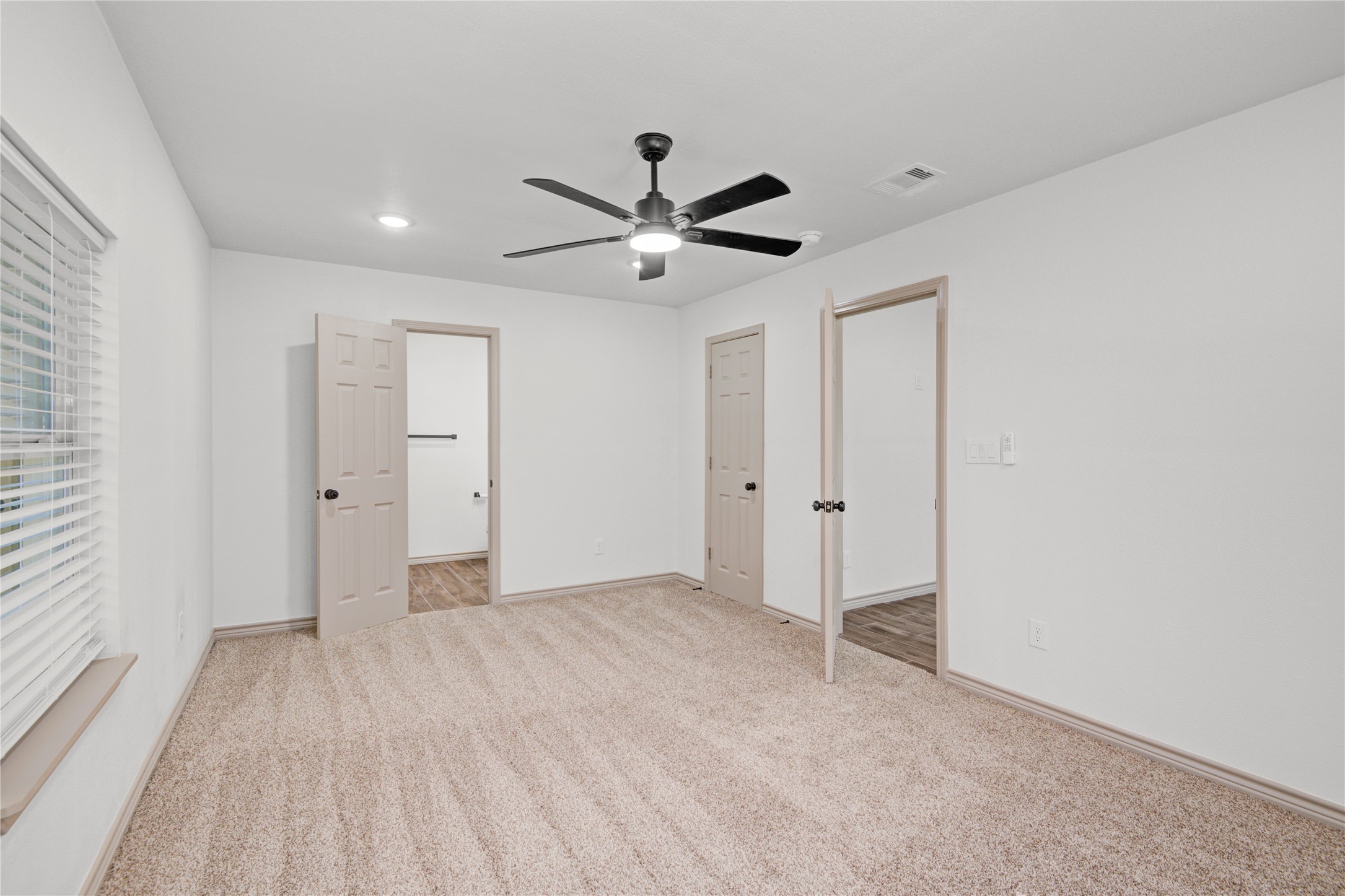 1530 West 10th Street Freeport, TX 77541 - Photo 25 of 32 a view of a livingroom with a ceiling fan & window