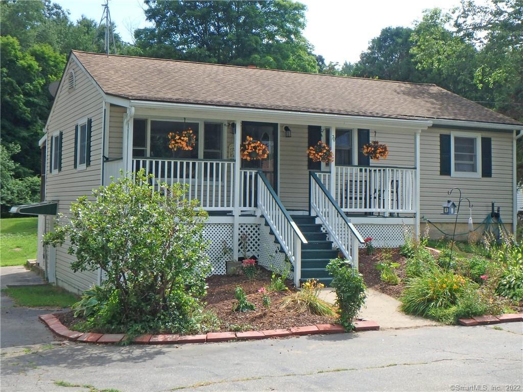 70 Benjamin Road Preston, CT 06365 - Photo 1 of 1 a front view of a house with a yard