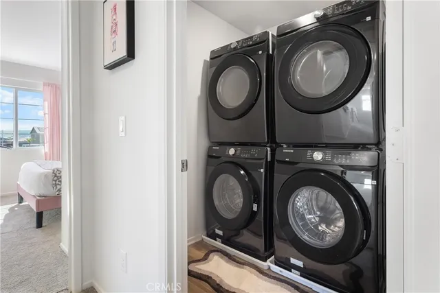 a view of washer and dryer in a utility room