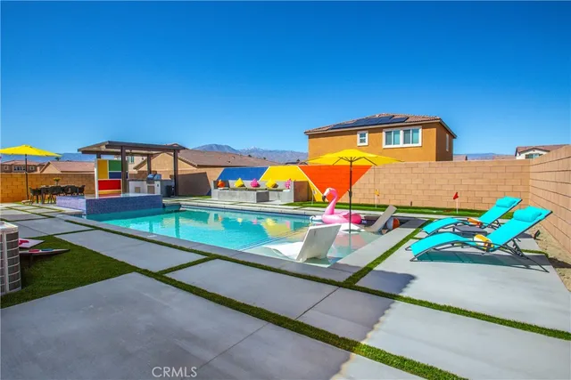 a view of a park with swings and slides