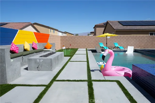 a backyard of a house with seating space