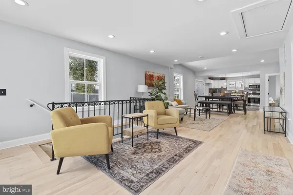 a living room with furniture and a table