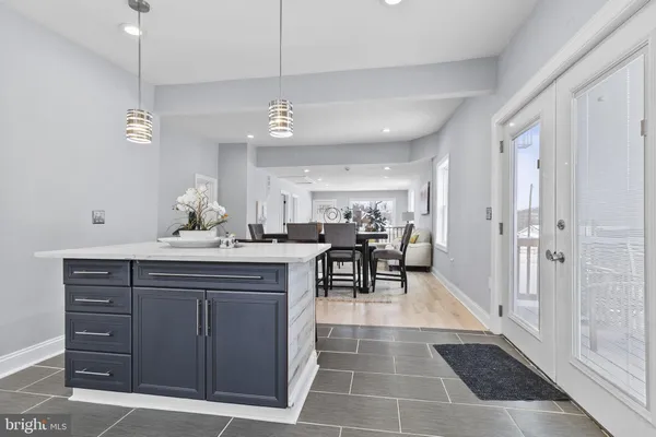 a view of a center island table and chairs