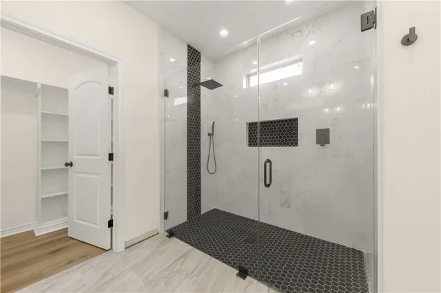 a view of a hallway with closet