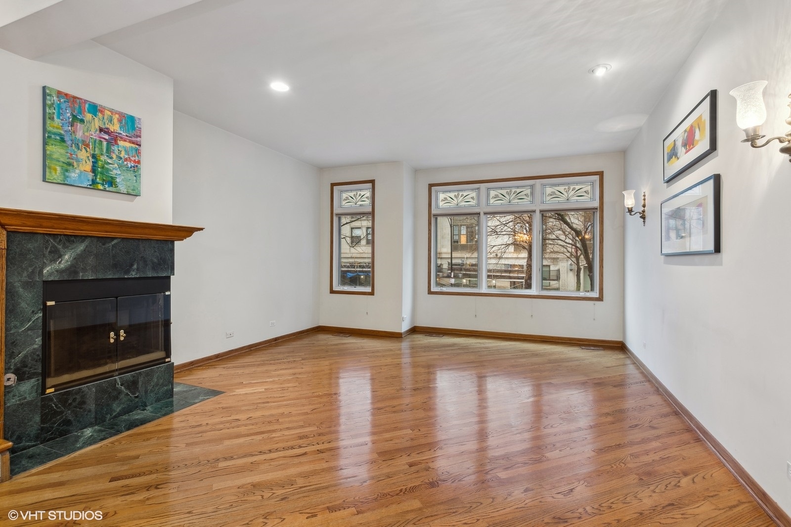 1447 South Indiana Avenue Chicago, IL 60605 - Photo 4 of 23 a view of an empty room with window and fire place
