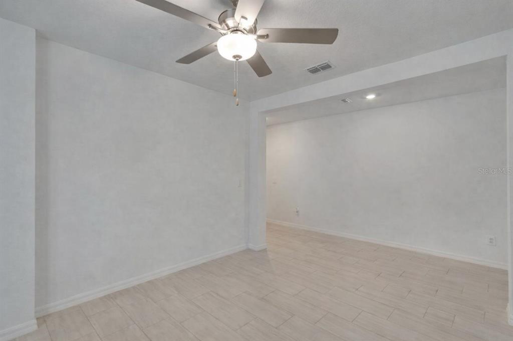 34780 Rainville Loop Zephyrhills, FL 33541 - Photo 12 of 30 a view of an empty room