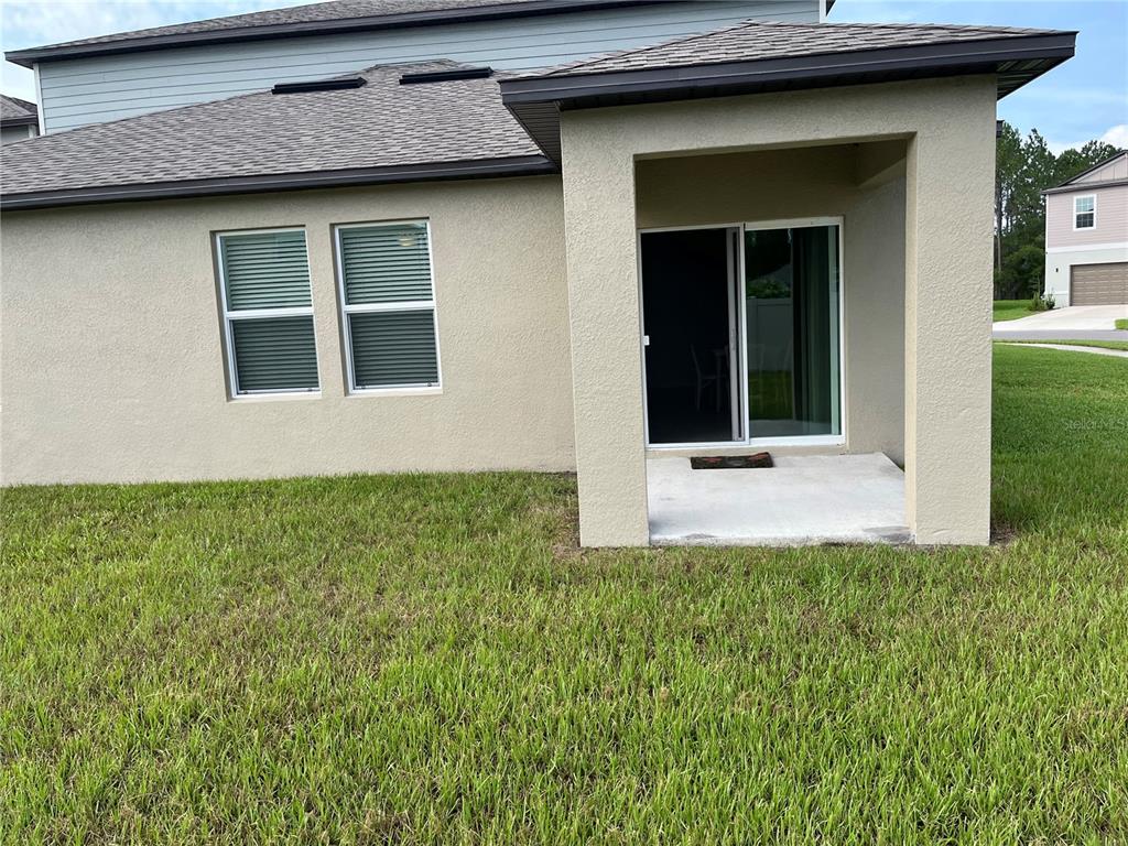34780 Rainville Loop Zephyrhills, FL 33541 - Photo 29 of 30 a view of an entrance of the house
