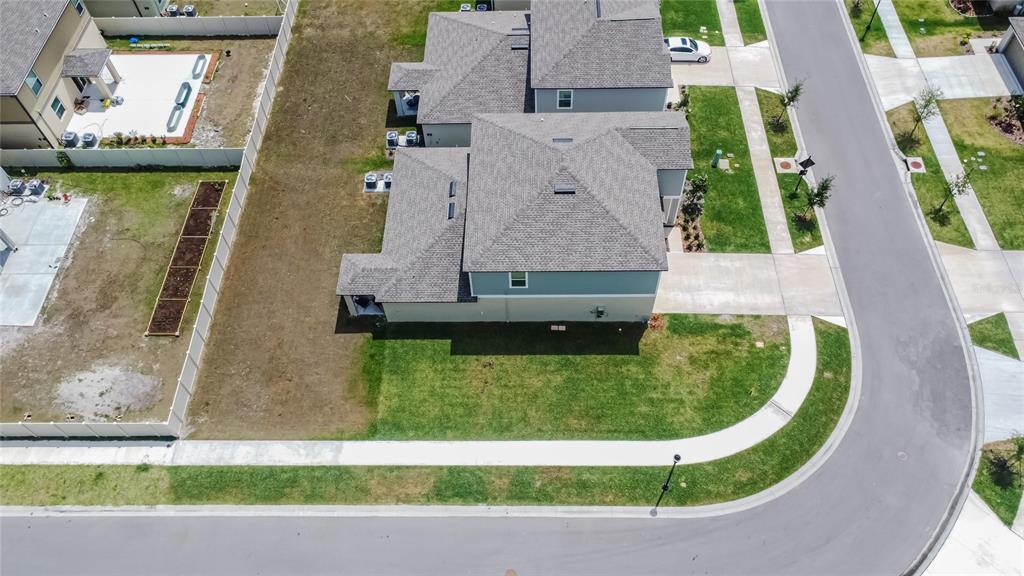34780 Rainville Loop Zephyrhills, FL 33541 - Photo 4 of 30 an aerial view of a house