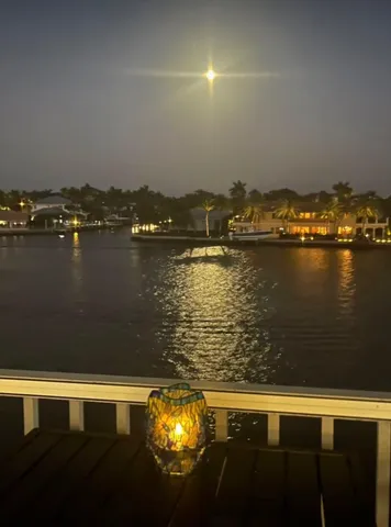 a view of a lake from a balcony
