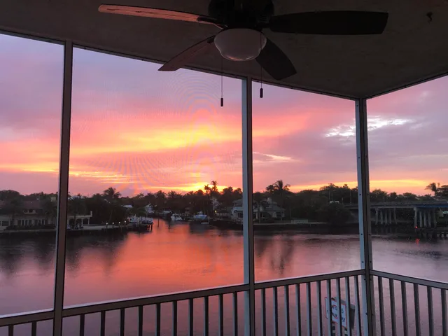a view of a lake from a balcony