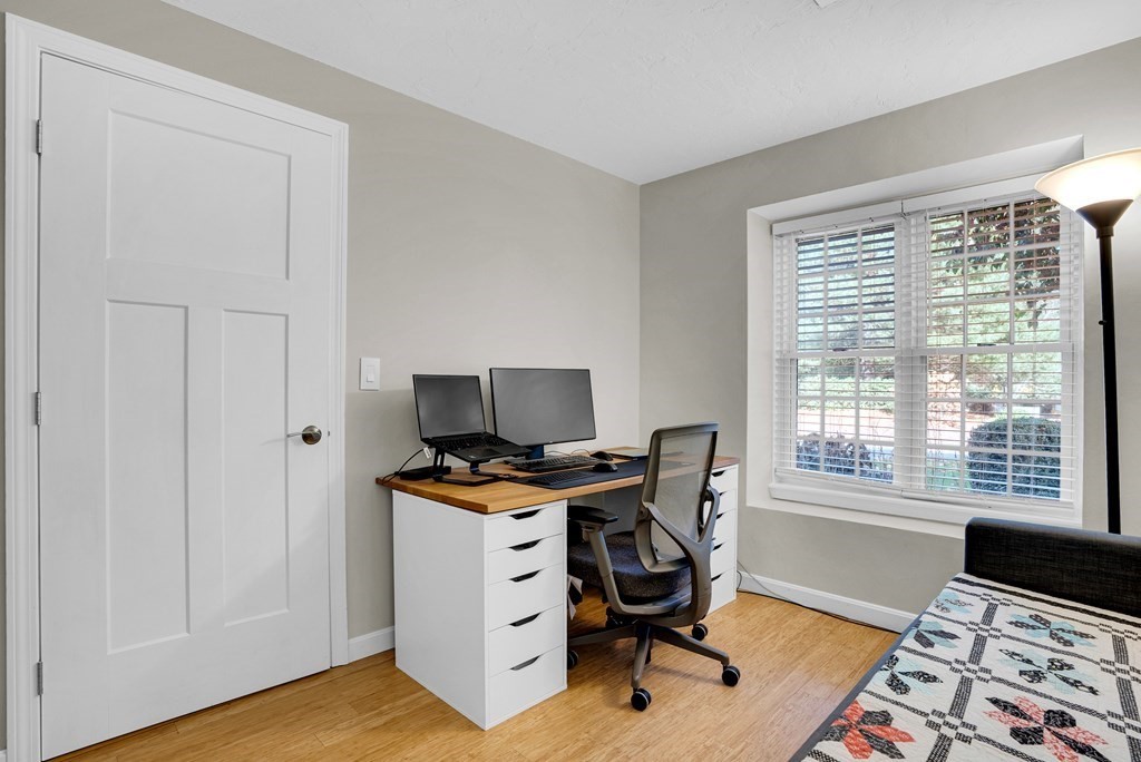 214 Ridgefield Circle, Unit B Clinton, MA 01510 - Photo 19 of 32 a workspace with furniture and a window