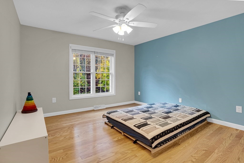 214 Ridgefield Circle, Unit B Clinton, MA 01510 - Photo 24 of 32 a living room with furniture rug and window