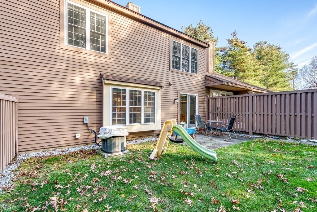 214 Ridgefield Circle, Unit B Clinton, MA 01510 - Photo 31 of 32 a house view with a garden space