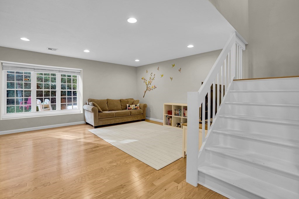 214 Ridgefield Circle, Unit B Clinton, MA 01510 - Photo 4 of 32 a living room with furniture and a window