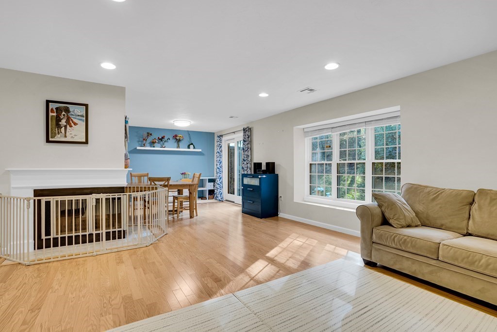214 Ridgefield Circle, Unit B Clinton, MA 01510 - Photo 6 of 32 a living room with furniture and a window