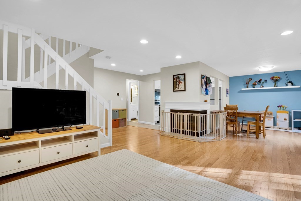 214 Ridgefield Circle, Unit B Clinton, MA 01510 - Photo 8 of 32 a living room with furniture and a flat screen tv