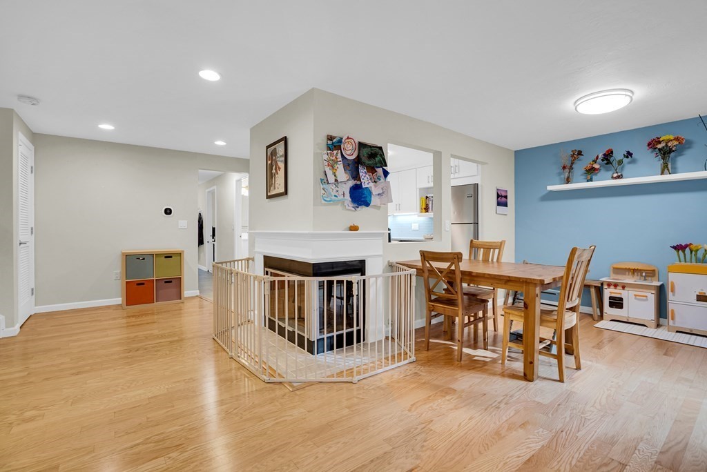 214 Ridgefield Circle, Unit B Clinton, MA 01510 - Photo 9 of 32 a living room with furniture and wooden floor