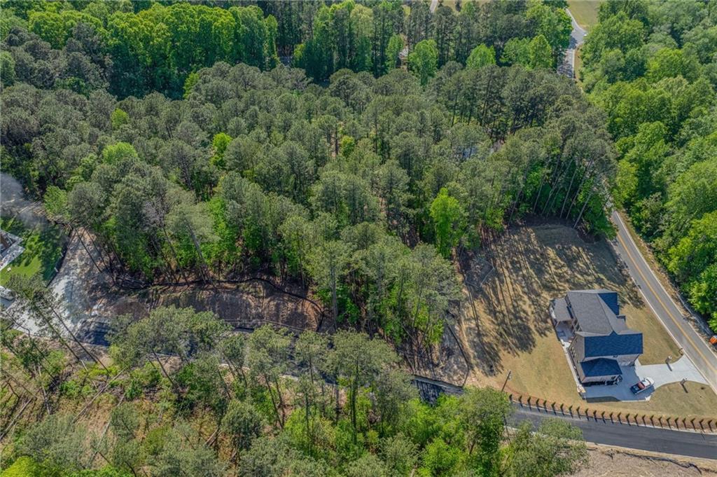 1559 Whitley Road Dacula, GA 30019 - Photo 32 of 34 an aerial view of a house with a yard