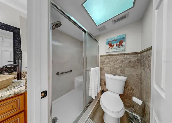 a en suite bathroom with a shower and a tub