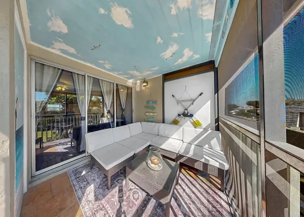 an aerial view of a house with outdoor space