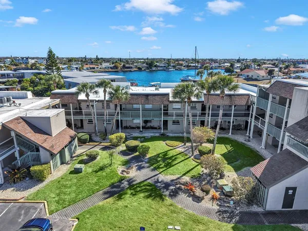 an aerial view of a house with a garden