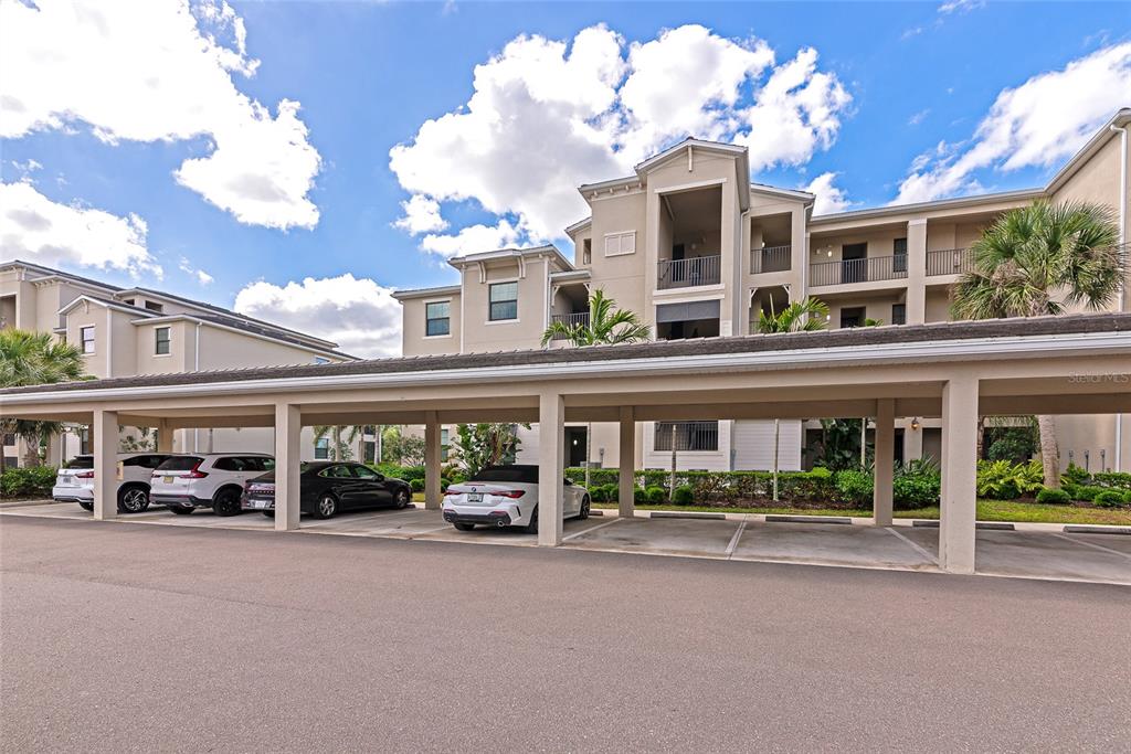 18008 Gawthrop Drive, Unit 101 Lakewood Ranch, FL 34211 - Photo 3 of 56 front view of a building with a street view