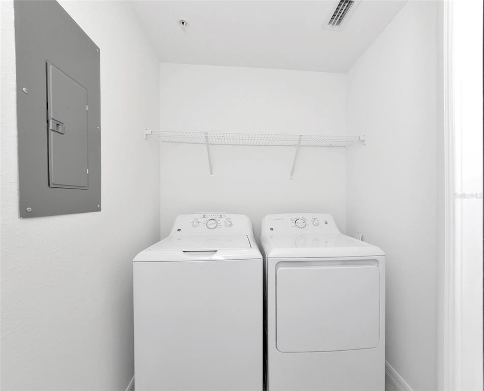 18008 Gawthrop Drive, Unit 101 Lakewood Ranch, FL 34211 - Photo 34 of 56 a utility room with dryer and washer