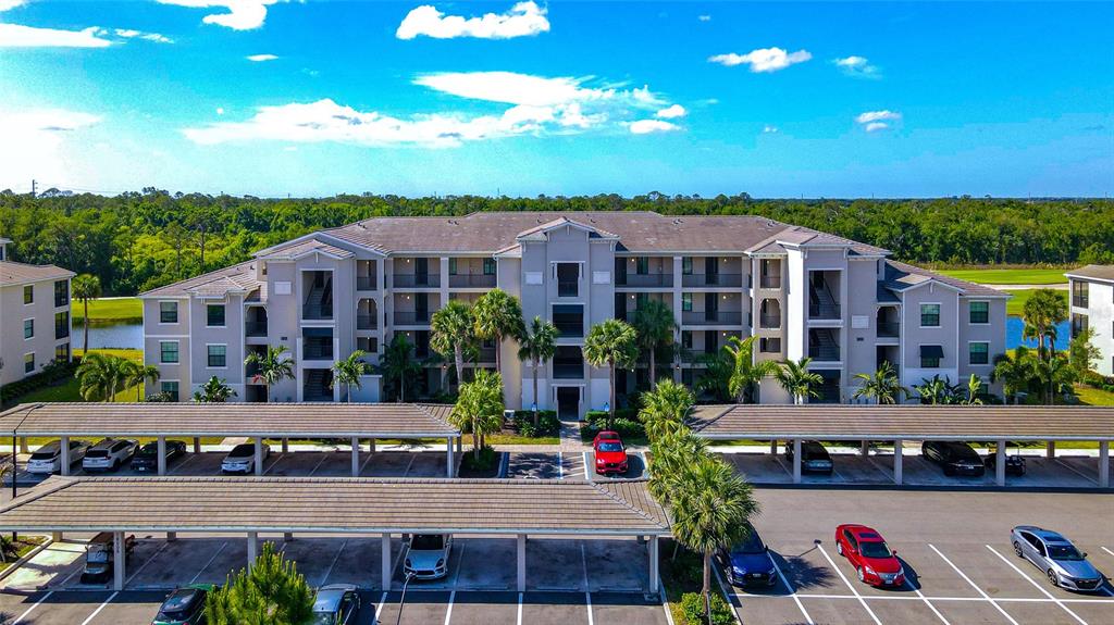 18008 Gawthrop Drive, Unit 101 Lakewood Ranch, FL 34211 - Photo 40 of 56 a front view of a building with street view