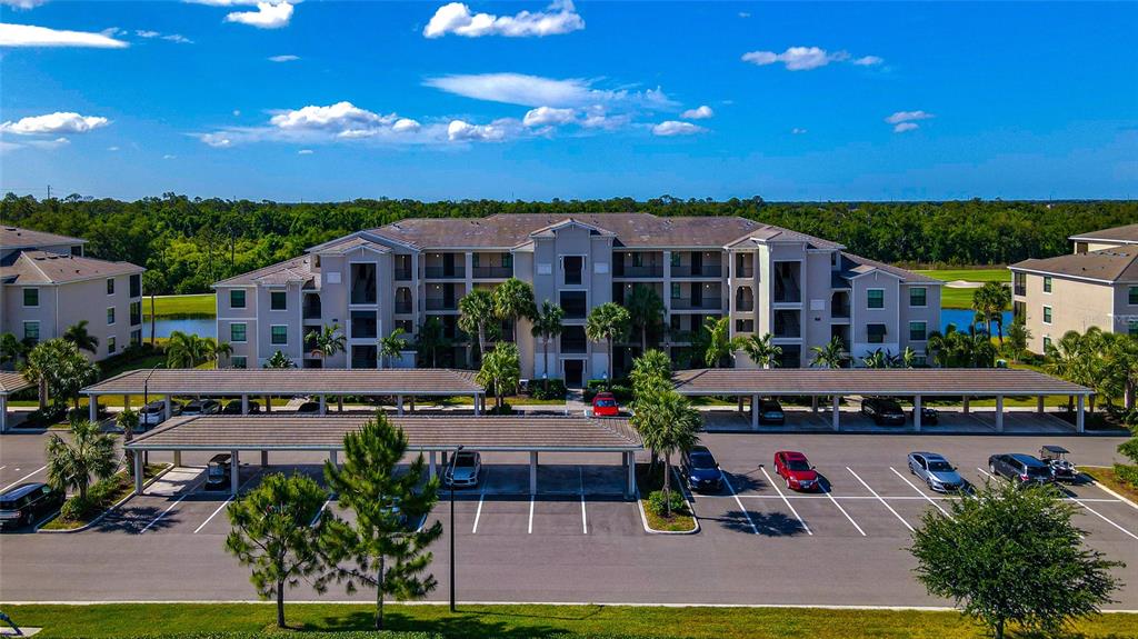 18008 Gawthrop Drive, Unit 101 Lakewood Ranch, FL 34211 - Photo 41 of 56 front view of a house with a patio