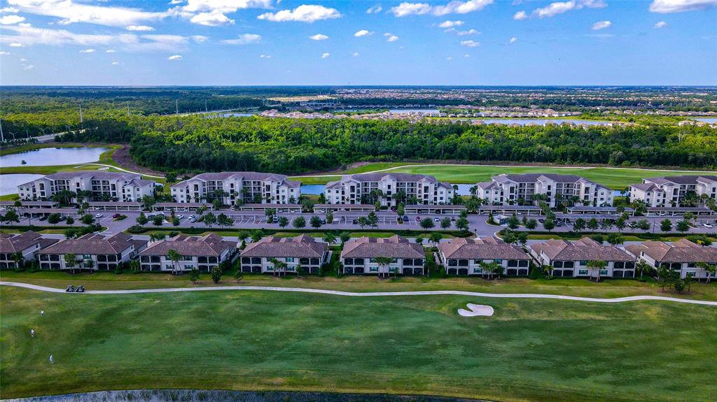 18008 Gawthrop Drive, Unit 101 Lakewood Ranch, FL 34211 - Photo 49 of 56 a view of a city with lots of green space