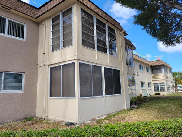 a view of outdoor space yard and front view of a house