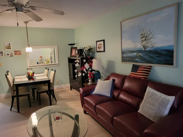 a view of a livingroom with furniture and a couch
