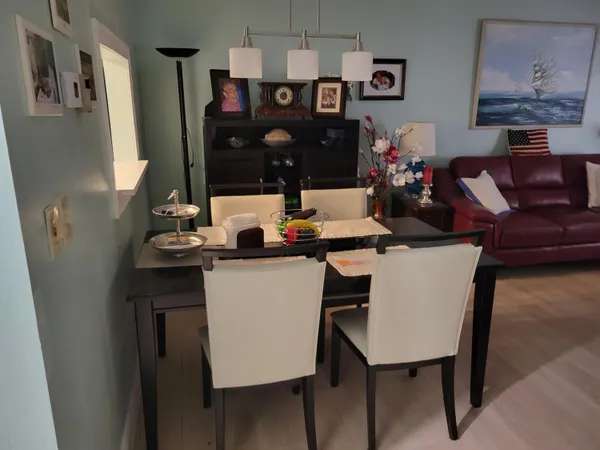 a view of a dining room with furniture